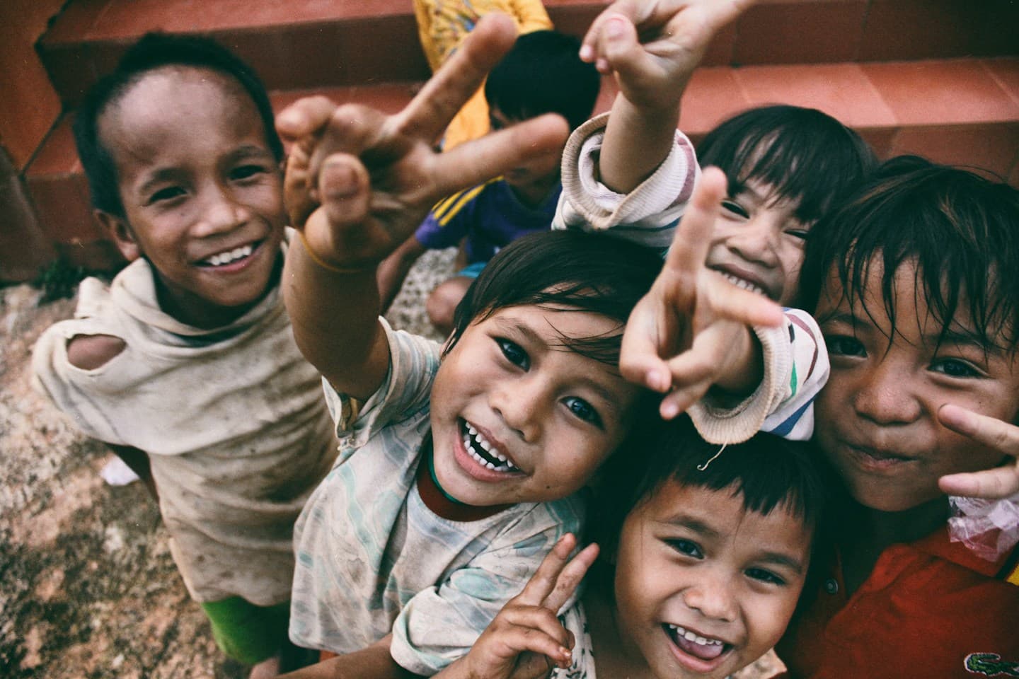 Children together in an outdoor community setting