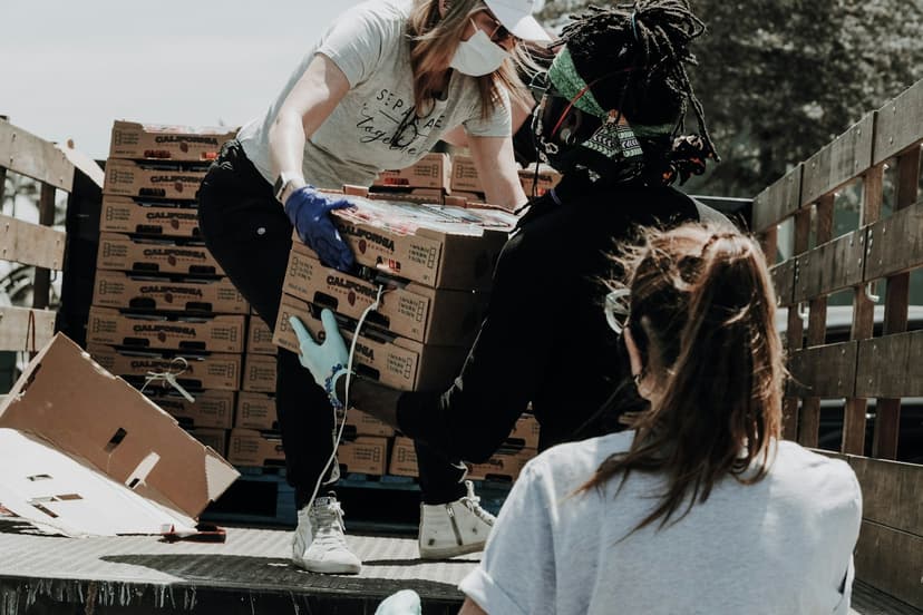 Volunteers organising food supplies for distribution